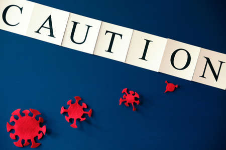 Covid-19 alert, text "Caution"の写真素材