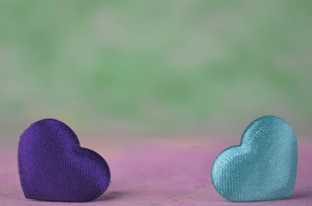 Valentine's Day heart fabric color over light backgroundの写真素材