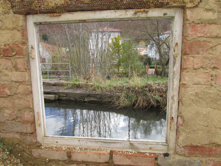 Looking out the window of a ruin