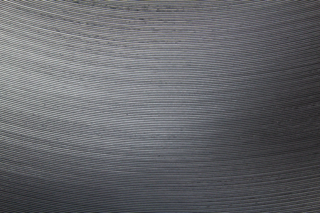 a flat aluminium is winded in a roll on a productionの写真素材
