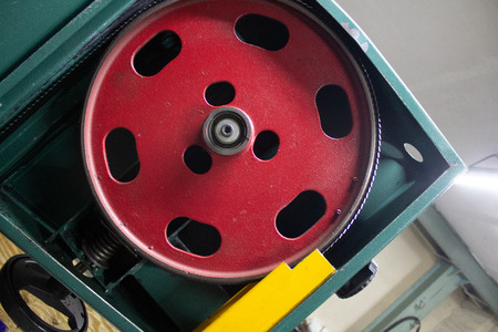 fly-wheel with linen of band saw in a detachable machine-toolの写真素材