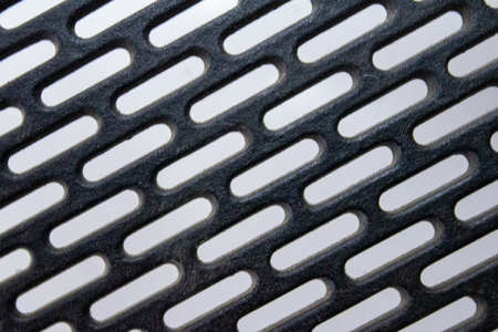 Black plastic mesh with oval long cellsの写真素材