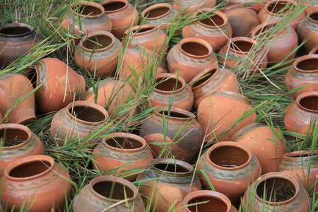 decorative clay vase in gardenの写真素材