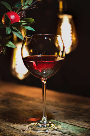Wine glass and garnetの写真素材