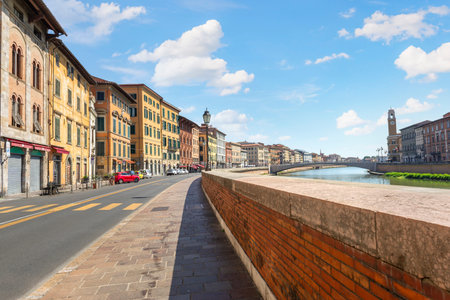 Waterfront on river Arno in Pisa, Italyの写真素材