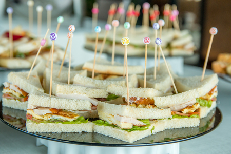 Decorated desserts with fruits and sausage, greens, biscuits.の写真素材