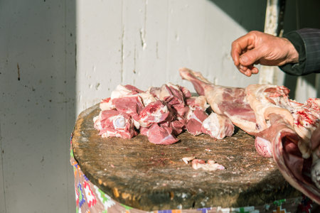 Meat or butcher shop at vintage or old market. Fresh meat on wooden stump. Meat shop concept.の写真素材