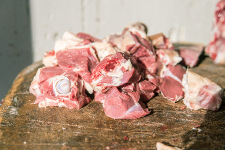 Meat or butcher shop at vintage or old market. Fresh meat on wooden stump. Meat shop concept.の写真素材