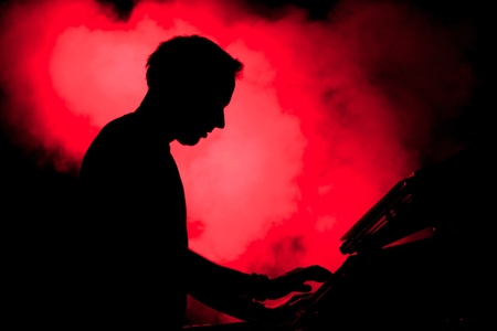 Silhouette of a pianistの写真素材