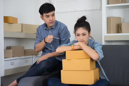 Bored young woman work during the packing of the customer, Concnet SME, Deviery Online Concept.