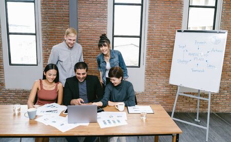 Young entrepreneur work with new startup project in Modern Boardroom. Business concept. Team work.の写真素材