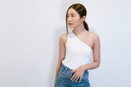 Portrait of fashion beautiful young sexy Asian woman and slim body  standing and looking away...