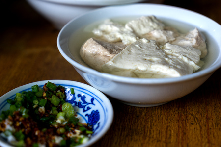 Tofu dish with condimentの写真素材