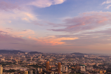 dramatic purple  sky  and clouds over Kuala Lumpur city centre, Malaysiaの写真素材