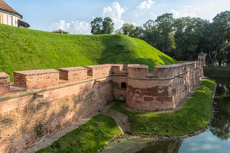 Ancient restored castle with a moat in the Nesvizh  city. Belarus.の写真素材