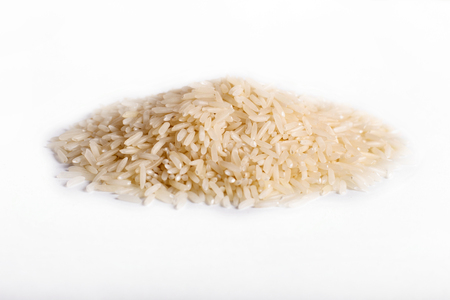 Pile of  basmati rice isolated on white background.  Top view.の写真素材