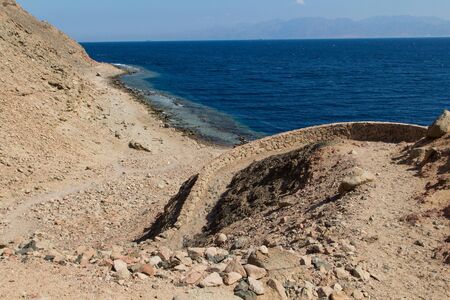 The coastline of the Red Sea and the mountains in the background. Egypt, the Sinai Peninsula, Dahab.の写真素材