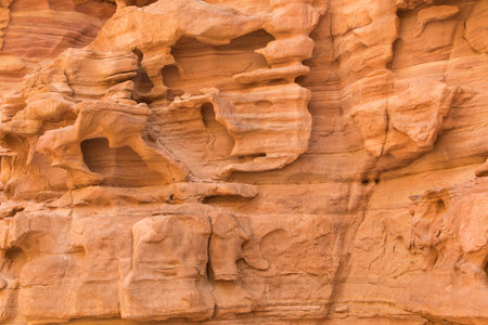 Natural texture of red rocks. Colored canyon, Egypt, desert, the Sinai Peninsula, Nuweiba, Dahab.の写真素材