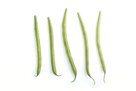 Bunch of green french beans isolated on white