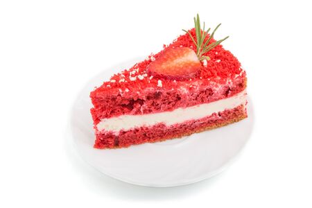 Homemade red velvet cake with milk cream and strawberry isolated on white background. side view, close up.の写真素材