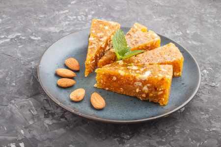 Traditional turkish candy cezerye made from caramelised melon, roasted walnuts, hazelnuts,...