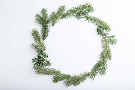 Christmas or New Year wreath composition. Decorations, fir and spruce branches, on white background. Top view, copy space, flat lay.の写真素材