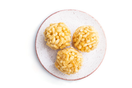 Traditional Tatar candy chak-chak made of dough and honey isolated on white background. top view,...
