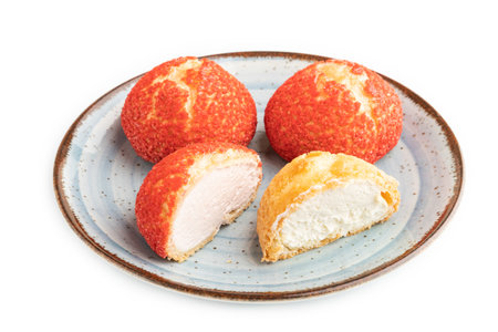 Traditional french custard dessert shu cake isolated on white background. side view, flat lay, close up. Breakfast, morning, concept.の写真素材