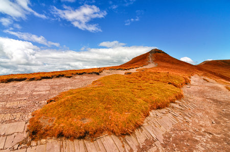 July 13, 2016 -  Hiking Pen Y Fan Mountain in  south Wales, situated in the Brecon Beacons National...