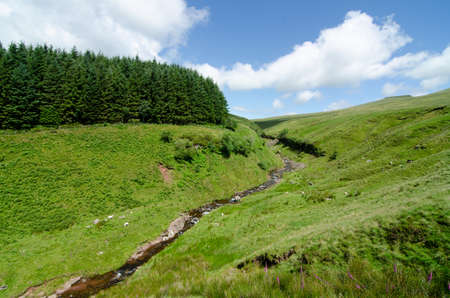 July 13, 2016 -  Hiking Pen Y Fan Mountain in  south Wales, situated in the Brecon Beacons National Park. Beautiful scenic with fresh air.のeditorial素材