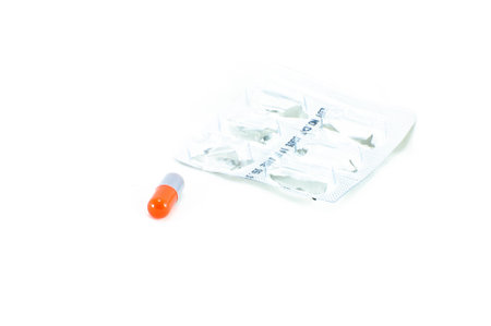 The red and gray pill on white isolate background.