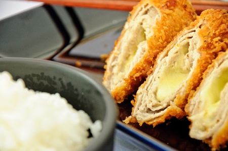 Japanese deep fried roll pork with cheese. Serve with Japanese rice.の写真素材
