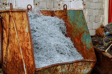 Metal waste in a metal container.