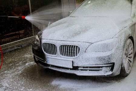 Uzhhorod, Ukraine, 7 August 2019: Self-service car wash. Wash high pressure water and foamのeditorial素材