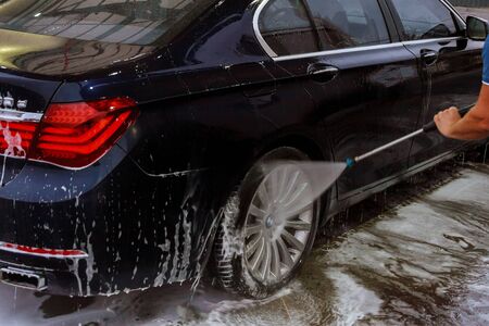 Uzhhorod, Ukraine, 7 August 2019: Self-service car wash. Wash high pressure water and foamのeditorial素材