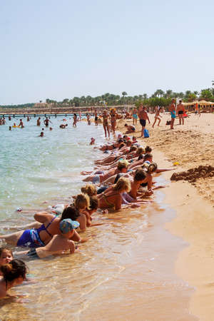 Hurghada, Egypt, 16 october 2018: A group of people doing water aerobics on the beach of the Red Sea.のeditorial素材