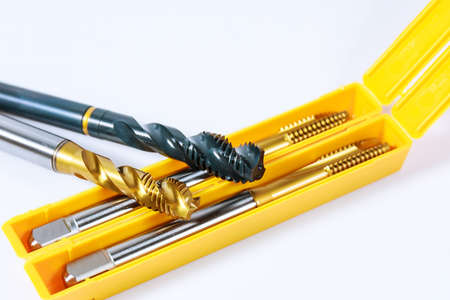 Set of tap for threading in metal in box. Tool for metal processing.の写真素材