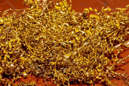 Copper shavings. Copper processing on CNC machines in productionの写真素材