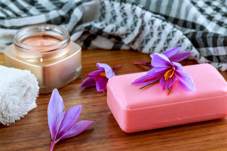 Saffron soap with saffron stigma. Crocus flowers. Saffron soap and cream. The use of saffron in cosmetology. Natural cosmetic.の写真素材
