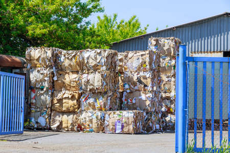 Waste paper bales at a processing plant. Protection against environmental pollution. Clean Air.の写真素材