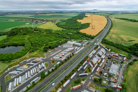 1 July 2021 Czech Republic Sirejovice: Parking for trucks by the road, rest for drivers, gas station. Parking in the mountains. top view.のeditorial素材