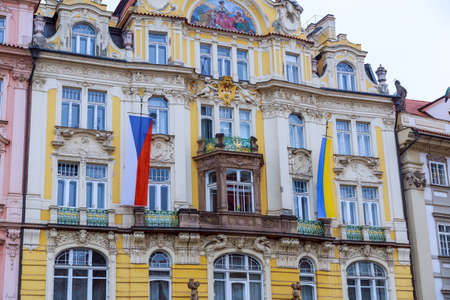 7 March 2022 Prague, Czech Republic: Flags of the Czech Republic and Ukraine on an architectural building in Prague. state flags.のeditorial素材