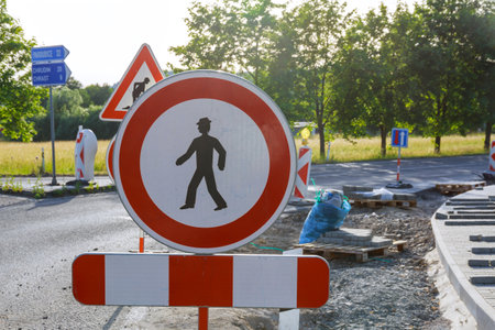 The passage of pedestrians is prohibited, the repair of the pedestrian zone, the laying of paving stones and curbs.の写真素材