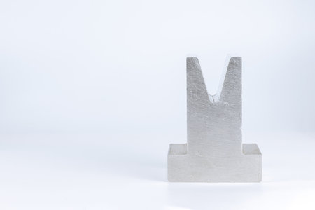 Sheet metal bending tool and equipment isolated on a white background. Bend tools, press brake punch and die.の写真素材