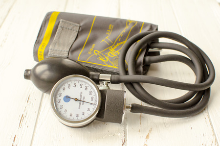 Apparatus for measuring the pressure on white wooden backgroundの写真素材