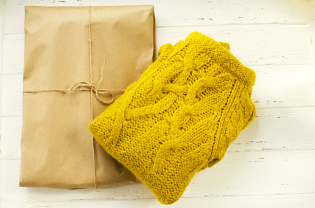 Sweater with packaging from kraft paperの写真素材