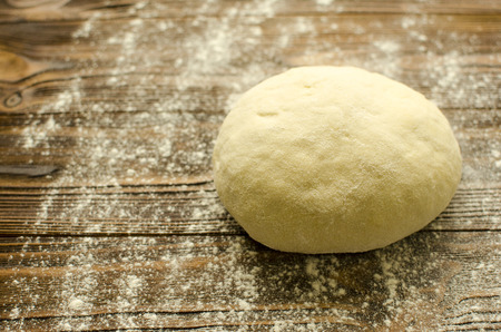 Dough on wooden backgroundの写真素材