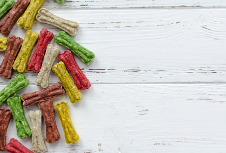 multicolored chewing bones with rice. dog food.の写真素材