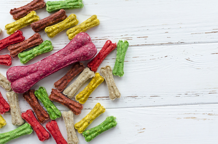 multicolored chewing bones with rice. dog food.の写真素材