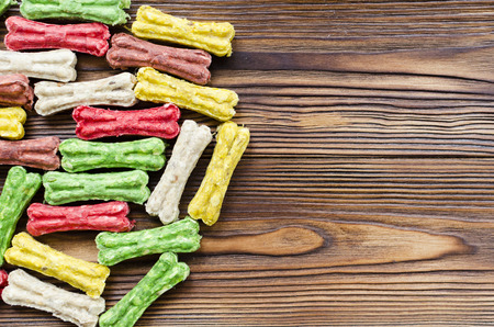 multicolored chewing bones with rice. dog food.の写真素材